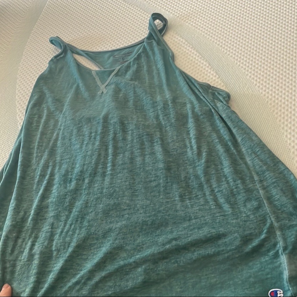 Champion tank top.Worn a few times.Super thin/see through.fits kinda long.